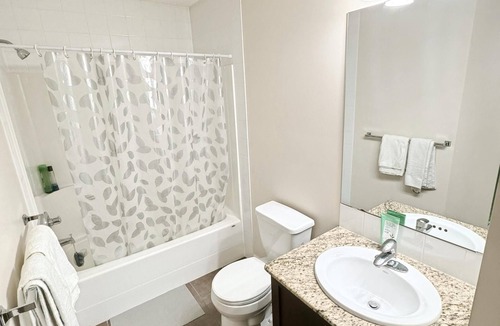 Calgary House | Relaxing room, share bathroom