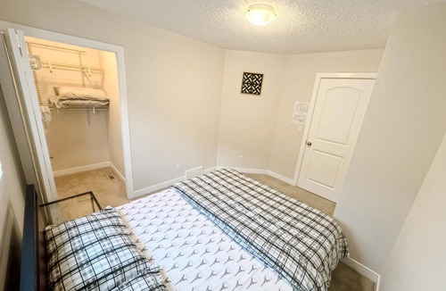 Calgary House | Relaxing room, share bathroom