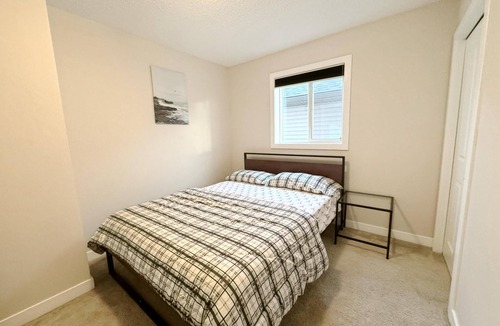 Calgary House | Relaxing room, share bathroom