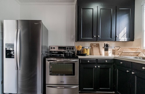 Delray Beach House | Remodeled HEATED pool home, 8 minutes to the beach! Honey Hole & Bear Den