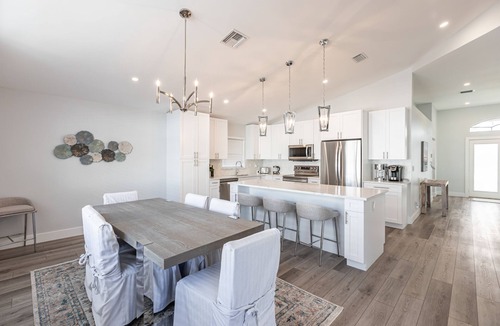 North Palm Beach Heights House | “Renovated 3BR Pool Home | Screened & Heated Pool | 3 King Beds”