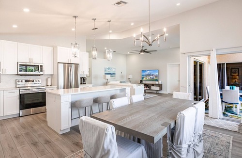 North Palm Beach Heights House | “Renovated 3BR Pool Home | Screened & Heated Pool | 3 King Beds”