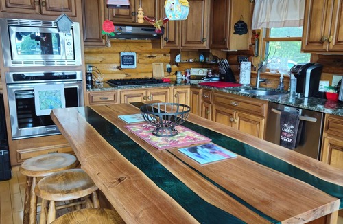 Manchester Cabin | Rent a log home on a private peninsula on Northwood Lake. Enjoy Paradise!