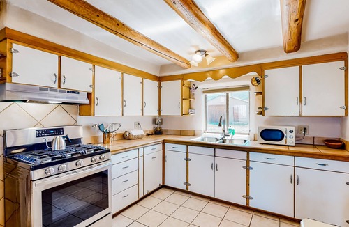 Taos House | Restored 1938 adobe with mountain view & kiva fireplace - dog-friendly