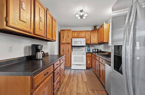 Rapid City House | Riley's Retreat Hot Tub and air conditioning!