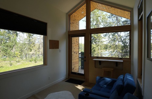 Rocky Mountain House Cabin | River South HardTop: modern decked-out cabin with a river view