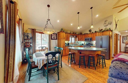 Manitowish Waters House | Riverfront home on the Manitowish Riverway w/fire pit, kayaks & boat house