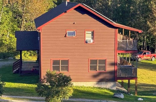 The Forks Cabin | Riverfront Queen Room in West Forks, Maine