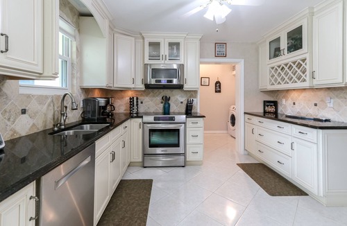 Sebastian House | Riverfront Retreat, Private Docks, on Small Acreage.