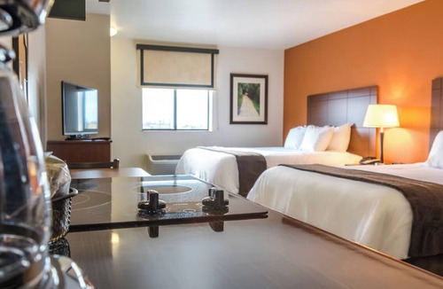 Rapid City Hotel | Room Near WaTiki, Dino Park, and Reptile Gardens! Pets Allowed! With Kitchen!