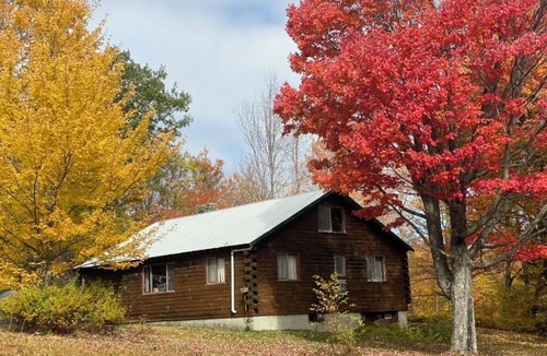 Ludlow Cabin | Rustic camping cabin on 360 acres with 2 lakes and trails, sleeps 8