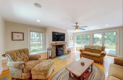 Ellsworth House | Secluded lakefront home with patio & firepit, fast WiFi, wood stove & W/D