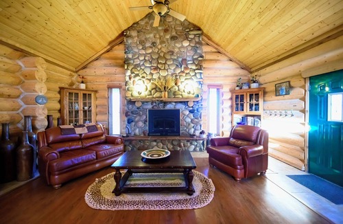 Cheyenne County Cabin | Secluded & Spacious Log Cabin Lodge Located in Western Nebraska - Pet-friendly!