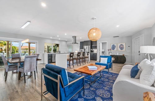 Singer Island Villa | Seven Palms Waterfront - Private Dock, Heated Pool & Lanai - Walk to Beach!