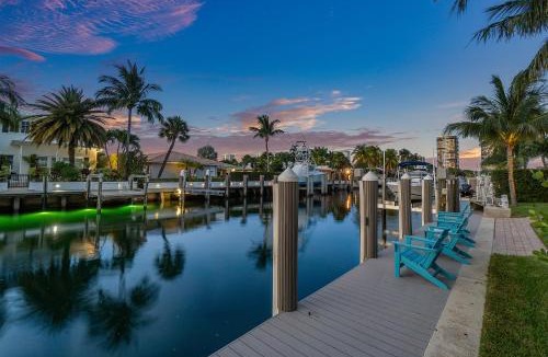Singer Island Villa | Seven Palms Waterfront- Private Dock, Heated Pool & Lanai -Walk to beach! by Maven Vacation Rentals