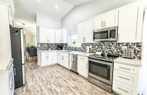 Lake Ida Shores Apartment | Shore & More — 5BR home in the Heart of It All