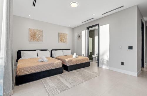 Ojus Villa | Signature Waterfront Villa by The Glamhomes