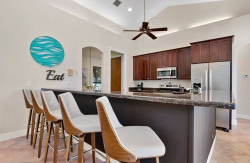 Singer Island House | Singer Island Beach Oasis: Heated Pool, Privacy Fence & Open Concept