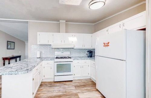 Gunnison House | Single-level home with a washer/dryer, patio & grill
