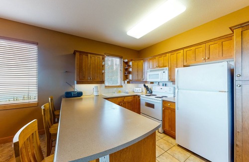 Big White Ski Resort Condo | Ski-in/out condo with private hot tub, majestic mountain views, & fireplace