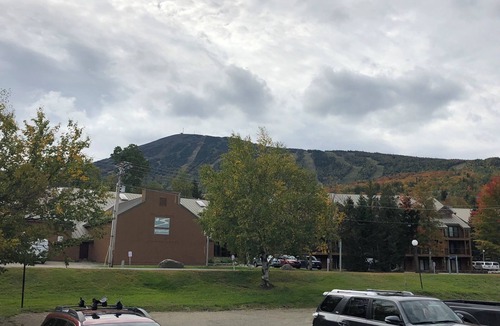 Carrabassett Valley Apartment | Ski In/Out at Sugarloaf Short Walk or Shuttle to Bars and Base Area Sleeps 4