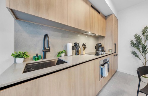 Downtown Miami Apartment | Sleek 1-BR & Den in Central Downtown