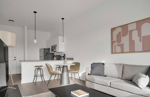 West Colfax Apartment | Sleek Sloan's Lake 1BR w/ Gym, W/D & Roof Deck, near Park, by Blueground