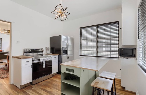 West Colfax House | Sloan’s Sweet Spot: 2BR Hideaway Near the Lake