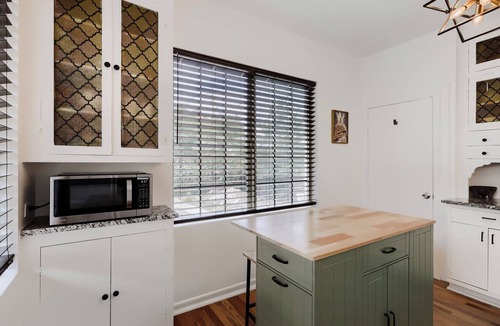 West Colfax House | Sloan’s Sweet Spot: 2BR Hideaway Near the Lake