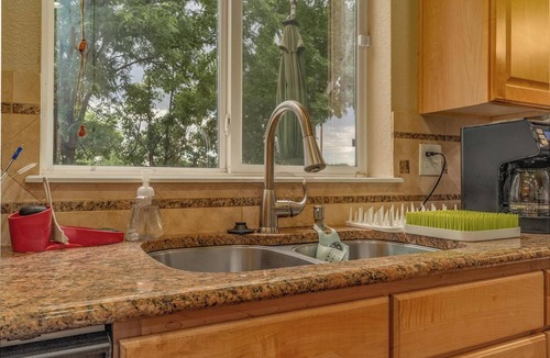 Virginia Village House | Spacious 4-bedroom house in charming Denver with game room and fitness room.