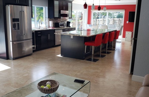 Survey Creek House | Spacious Modern Waterfront Lake Home with Heated Pool/15 min Drive to Beach!