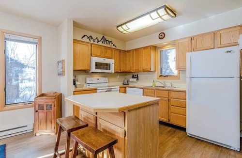 Jackson House | Spacious townhouse with ski & mountain views, deck, grill, & fireplace