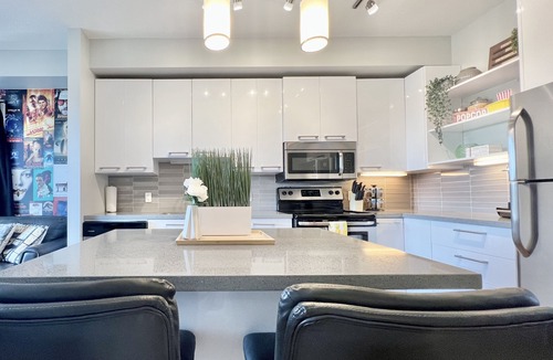 Whyte ave Condo | Strathcona/Whyte movie-themed condo-w/underground parking. Pet Friendly