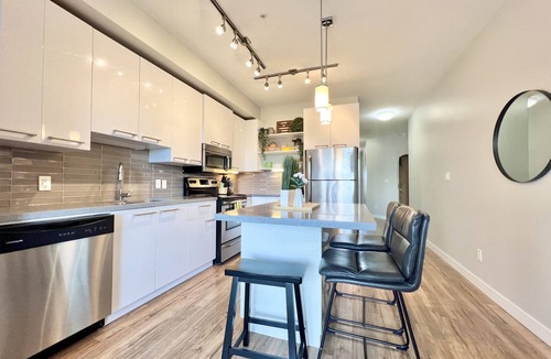 Whyte ave Condo | Strathcona/Whyte movie-themed condo-w/underground parking. Pet Friendly