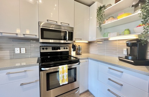 Whyte ave Condo | Strathcona/Whyte movie-themed condo-w/underground parking. Pet Friendly