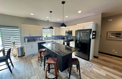 Sioux Falls House | Studio Loft Style Home in Sioux Falls w/Master Suite on main, Hot tub, & Sauna