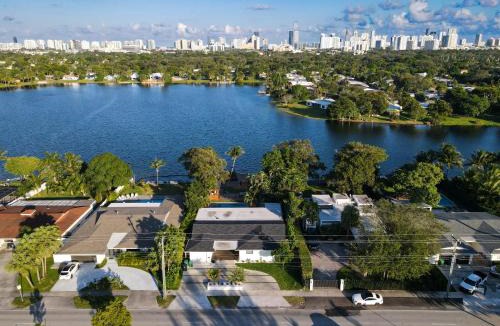 North Miami Beach Villa | Stunning Lakefront Villa - Deck, Pool, Kayak, PaddleBs