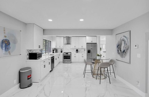 Deerfield Beach Villa | Stunning New Pool Jacuzzi 7BR Game Room Walk to the beach