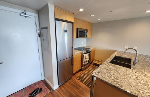Central Lonsdale Condo | Stylish 1BR w/View + Parking | Central Lonsdale | Quick Downtown Access