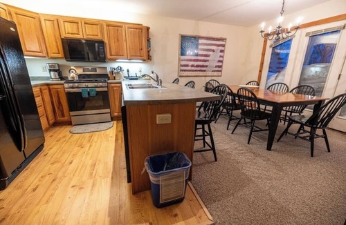 North Troy House | Sunny Jay Peak ski-in/ski-out condo w/fireplace!