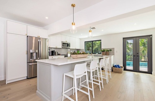 Southside House | Surf side retreat w/heated pool & beach steps