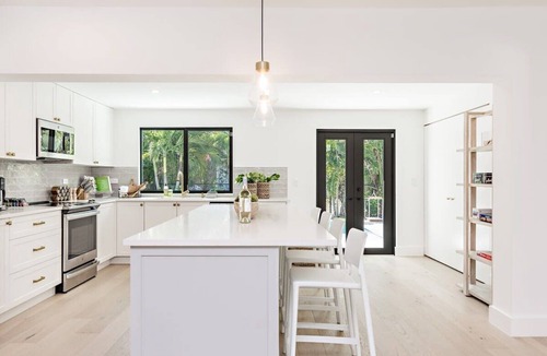 Southside House | Surf side retreat w/heated pool & beach steps