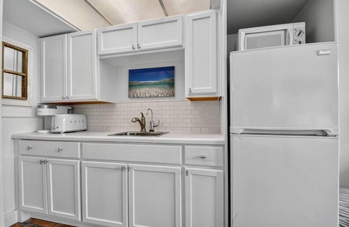 Palm Beach Condo | Surfs Up Palm Beach Steps To Beach Heated Pool