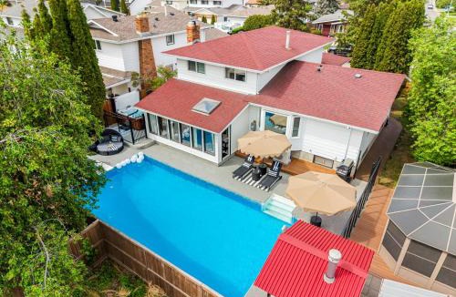 Southwest Edmonton Apartment | The Evergreen Château - Pool & HotTub - Barrel Sauna - Gym