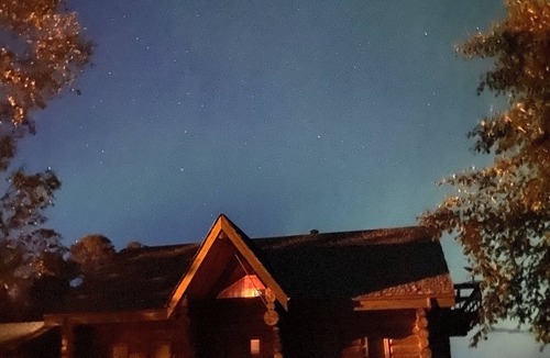 Nipawin House | The Lodge-Unique log home on the banks of the river