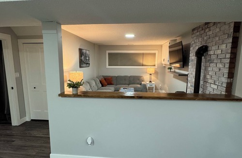 Prince George Apartment | The Paddle On Inn! A canoe-themed basement suite with all the modern finishes!