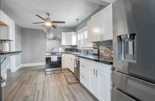 Akron House | This vintage home in Akron provides easy access to nearby cities & attractions.