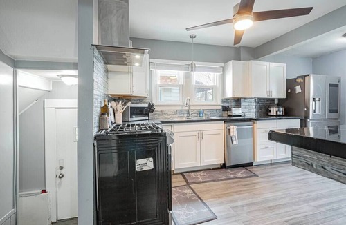 Akron House | This vintage home in Akron provides easy access to nearby cities & attractions.