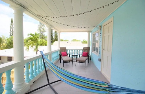 Mango Groves Apartment | Top SkyBlue Cottage Near Downtown and Beach