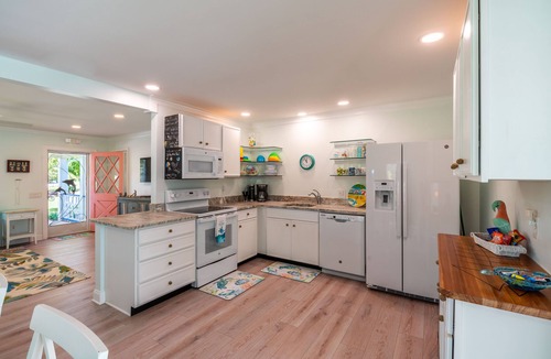 Vero Beach House | Tropical Getaway! Heated Pool, Tiki Bar, Pirate Sandbox, and Boat Parking!